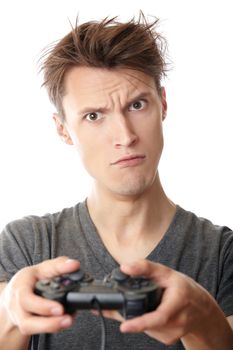 Man playing computer game and using joystick on a white background