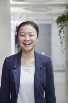 Businesswoman in the office, portrait
