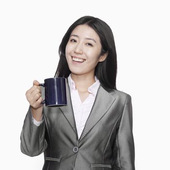 Businesswoman with coffee mug