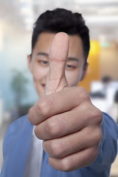 Businessman Giving Thumbs Up