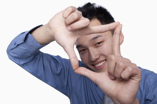Businessman Framing His Face