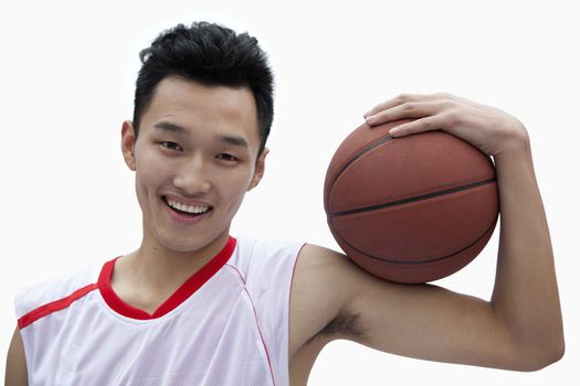 Basketball Player Holding Basketball