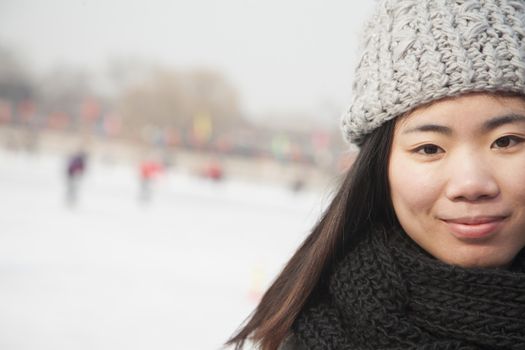 Young woman ice skating portrait, Beijing