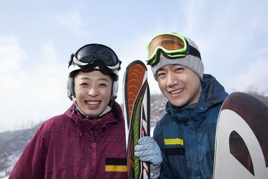 Smiling Couple in Ski Resort