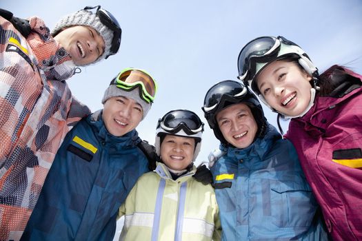 Group of Snowboarders in Ski Resort, low angle view