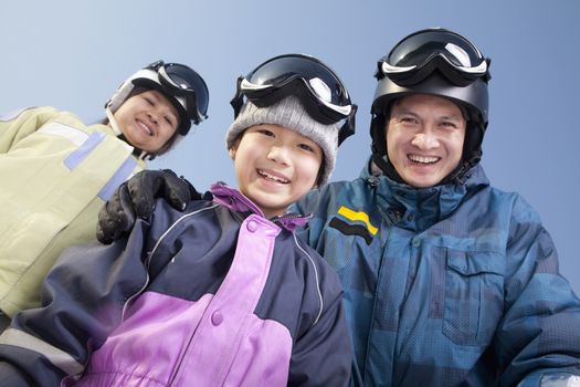 Family in Ski Resort, low angle view portrait