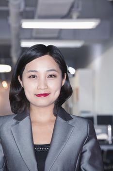 Portrait of smiling businesswoman in Beijing 