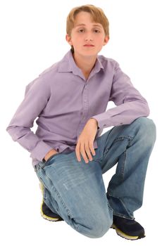 Handsome casual Caucasian teen boy over white background.
