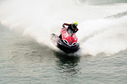 Ales - France - on July 14th, 2013 - Championship of France of Jet Ski on the river Gardon. jet ski in full speed 