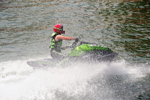 Ales - France - on July 14th, 2013 - Championship of France of Jet Ski on the river Gardon. Arrival in tight turn 