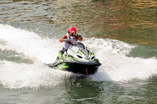 Ales - France - on July 14th, 2013 - Championship of France of Jet Ski on the river Gardon. Herv� Partouche on the happy finishing line to have made a good time