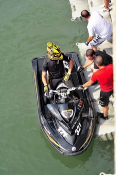 Ales - France - on July 14th, 2013 - Championship of France of Jet Ski on the river Gardon. Julien Cyril preparing before the race