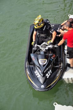 Ales - France - on July 14th, 2013 - Championship of France of Jet Ski on the river Gardon. Julien Cyril preparing before the race