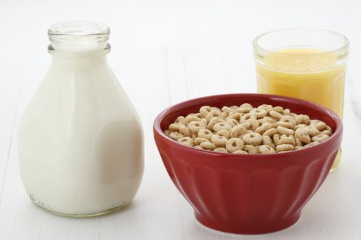 Delicious and nutritious lightly toasted honey, nuts and oats cereal with milk.