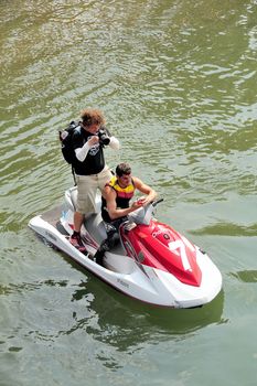 Ales - France - on July 14th, 2013 - Championship of France of Jet Ski on the river Gardon. Photographer on jet ski