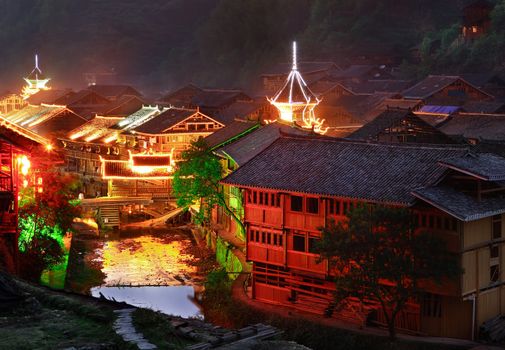 Zhaoxing Dong Village (Zhao Xing Dong Zhai) in Southeast Guizhou Miao and Dong Nationalities Autonomous Prefecture of southwest China is one of the largest ethnic Dong Minority towns in the region. It is surrounded by mountains at all sides and this is the main geographic feature. A river is flowing through the village center. 