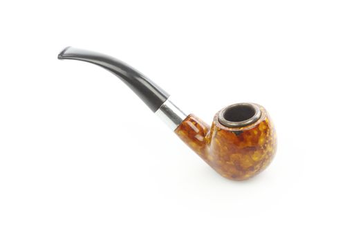 Close up of tobacco pipe on white background