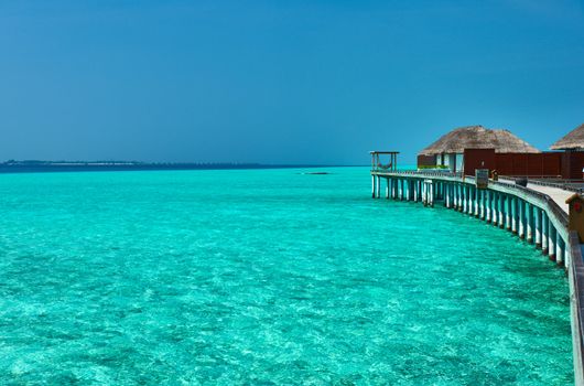 Beautiful beach with water bungalows at Maldives