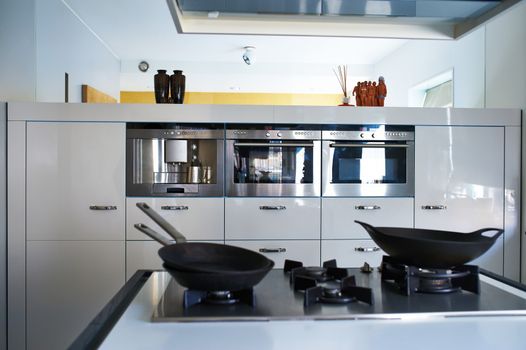 Modern luxury kitchen interior. No brandnames or copyright objects. 