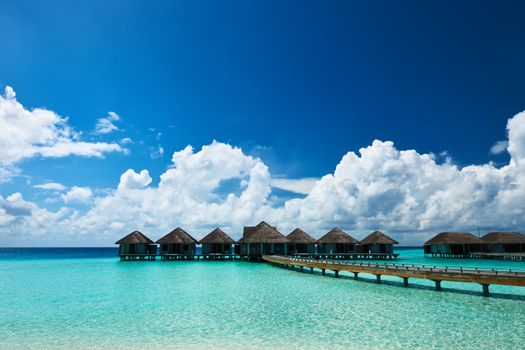 Beautiful beach with water bungalows at Maldives
