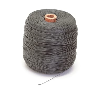 Spool of thread on white background