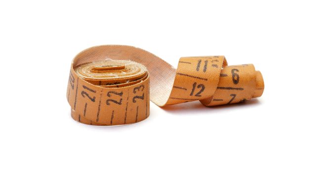 Measuring tape of the tailor isolated on white