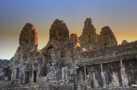 Eastern side  of Bayon temple at sunset   in Angkor Thom Cambodia. Bayon temple was built late 12th century under Jayavarman VII