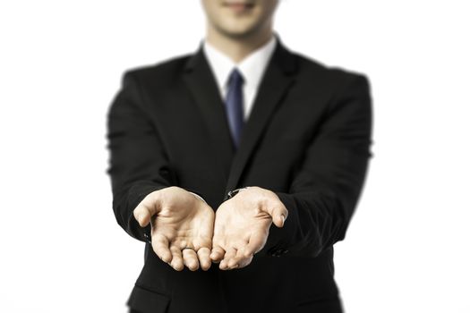 Businessman stretching out both hands to giving or receiving isolated on white background