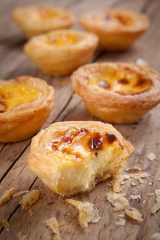 delicious portuguese egg tart on wood background