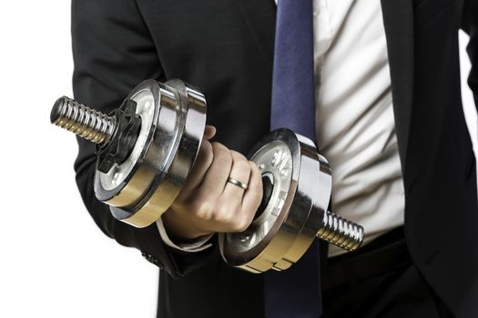 Businessman in black suit with a silver dumbbell