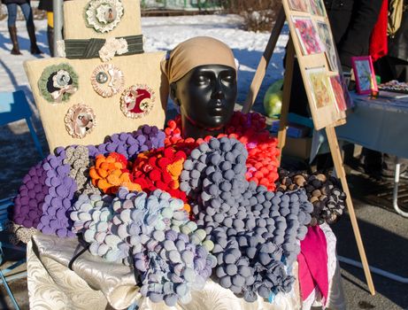 scarves headscarf and other women fabric apparel sold in street fair market.