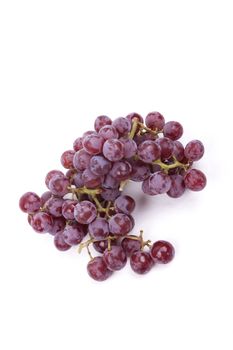 Cluster of red grapes isolated on a white background