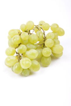 Cluster of green grapes isolated on a white background