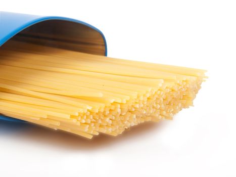 raw yellow spaghetti in blue case