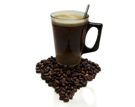 coffee with milk and beans in heart shape