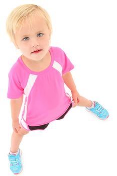 Adorable causian preschool child looking up at camera. clipping path.