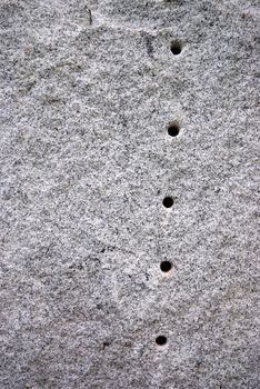 Round hole on the granite.The surface of Black and white granite stone. For texture background
