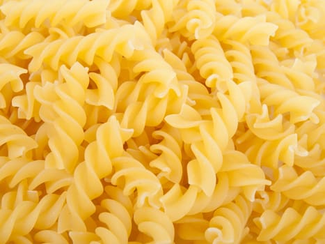 raw yellow fusilli - italian pasta
