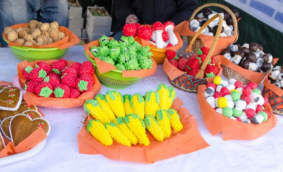 various colorful mushroom corn strawberry chestnut shape sweets sold in market spring fair.