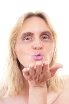 Beautiful mature rouged woman throwing kisses