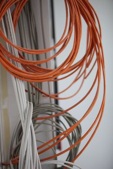 Coiled electric cable during installation of a power supply to a new build residence