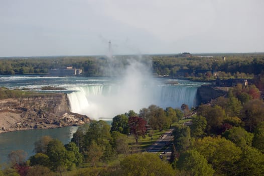 Blue-green water, falling down from Niagara falls.