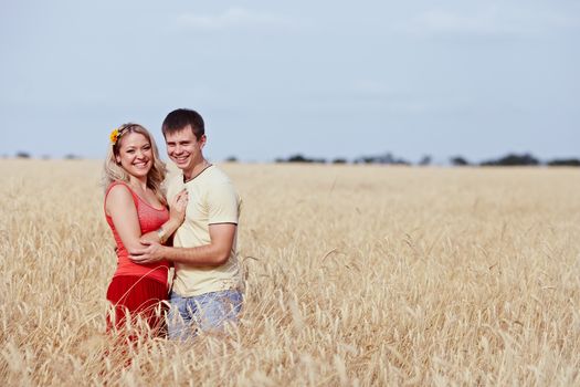 Laughing children in wheat field