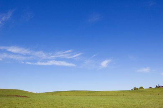 Agriculture farm fence under high blue sky