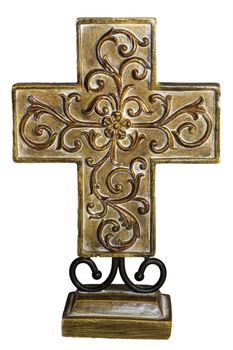 A brown decorative cross used for interior design.