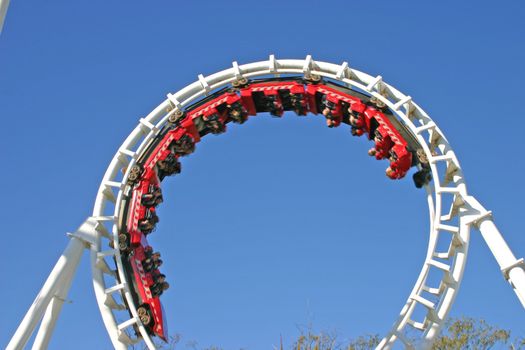 The thrills of a full 360 degree looping roller coaster.