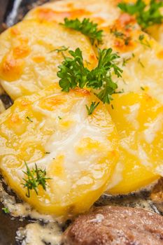 fried potatoes cooked in butter on the grill