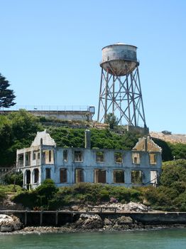The ruins of the officers club with the water tower in the background on Alcatraz Island.