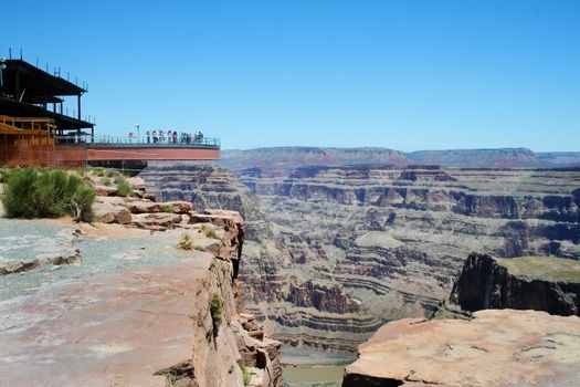 The glass skywalk observation bridge suspended four thousand feet above the Colorado River on the edge of the Grand Canyon West.