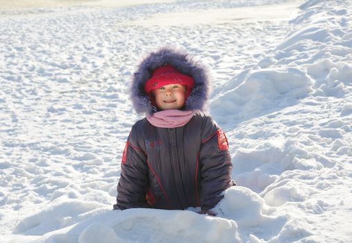 cheerful girl winter day walks in the nature